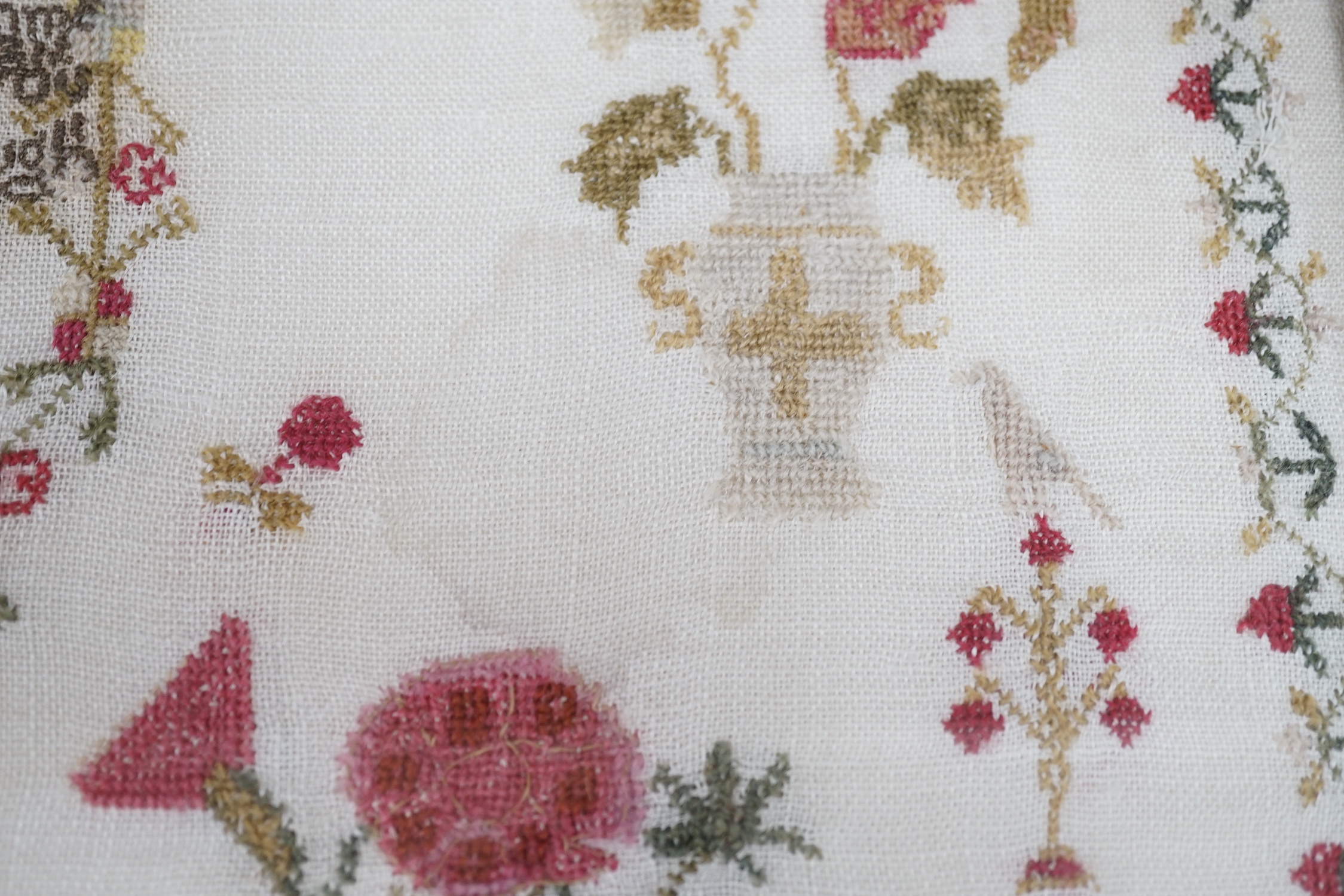 A framed 19th century sampler, 44cm sq excl frame